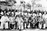 Kelantan's association with traditional Malay culture dates back at least as far as the 14th century, when the Sungai Kelantan Valley was settled by colonists from distant Java, then itself in the process of converting to Islam.<br/><br/>A state was established, owing allegiance to Sultan Masud Shah of Melaka (1459-77), but because of the region's geographical isolation from the rest of peninsular Malaysia, Kelantan was able to retain a high degree of autonomy, retaining much of its Javanese heritage and distinctive cultural and dialectic differences down through the centuries.<br/><br/>Kelantan's political isolation helped in this process - under a relatively benevolent Thai suzerainty from 1780 to 1909, Siamese control was generally limited to the presentation of bunga mas, or tribute paid to Bangkok in the form of golden trees. Once this tribute was paid, local administration remained largely in the hands of the Kelantan royal family, whilst matters social and religious were the exclusive province of the Kelantanese ulama, or learned Islamic scholars.<br/><br/>In 1909, by treaty agreement made between Britain and Siam, Kelantan became part of British-administered Malaya - but by this time the greater part of Chinese migration to the 'Straits Settlements' of Singapore, Melaka and Penang had already taken place, and Kelantan's ethnic balance remained relatively unchanged - a tranquil, traditional Malay sultanate, shielded by ranks of jungle-clad mountains from the fast-changing west coast.